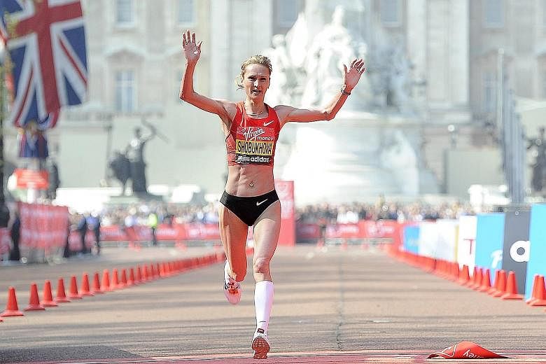 Russian Liliya Shobukhova finishing second in the London Marathon in 2011. While she has been stripped of her 2010 London and 2009, 2010 and 2011 Chicago titles, she was in late August allowed to compete again after her doping ban ended early for ass