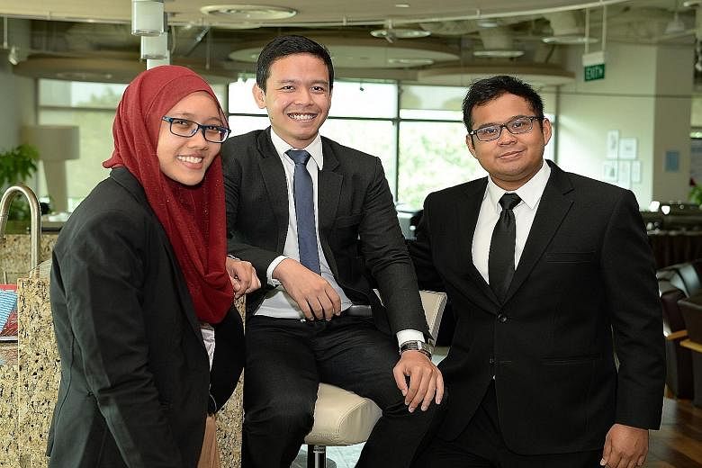 Scholarship recipients (from left) Nur Amalina Saparin, Muhammad Hafiz Kasman and Khairul Ashraf Khairul Anwar. The scholarship is open to full-time Malay Singaporean undergraduates in their second to fourth year at SMU. It will fund a year of their 