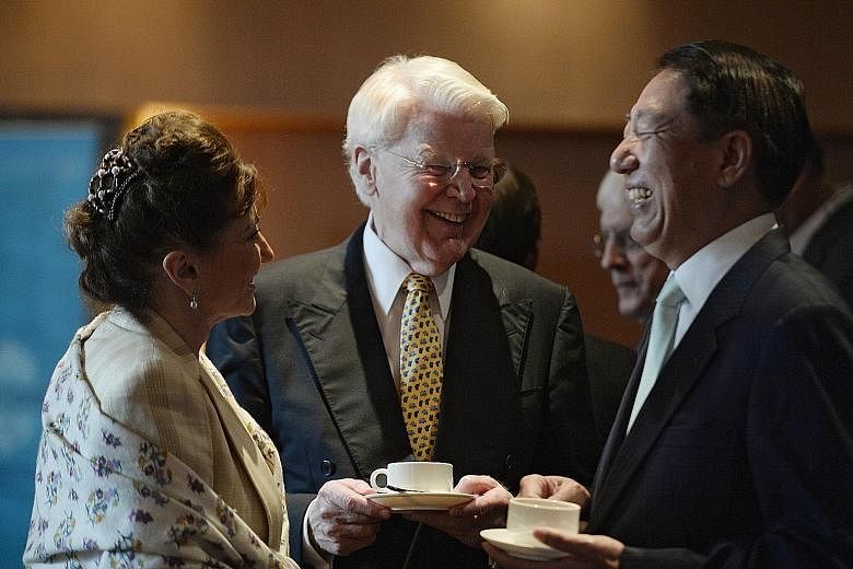 Icelandic President Olafur Ragnar Grimsson (centre) and his wife Dorrit Moussaieff with Deputy Prime Minister Teo Chee Hean after the opening session of the Arctic Forum at Marina Mandarin yesterday.