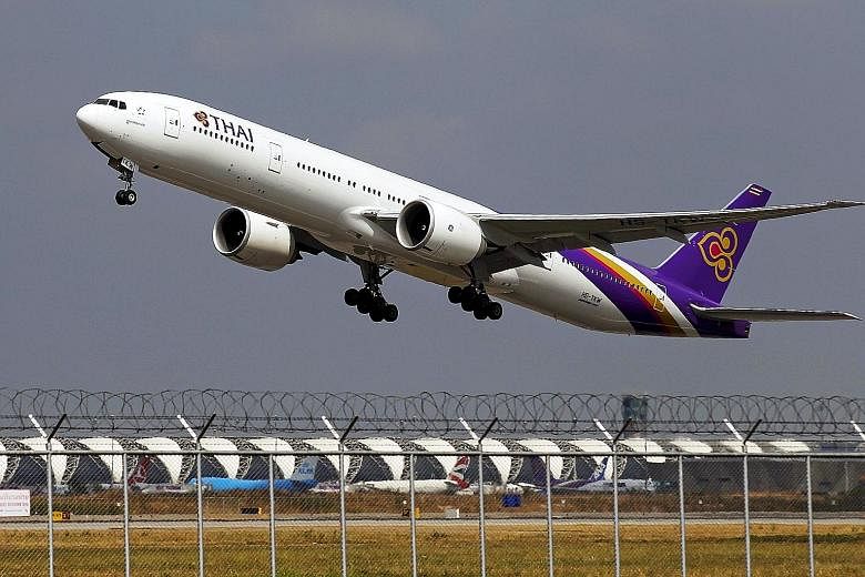 Thai Airways will cut the salaries of its top management by 10 per cent this month as part of plans to slash operating costs.
