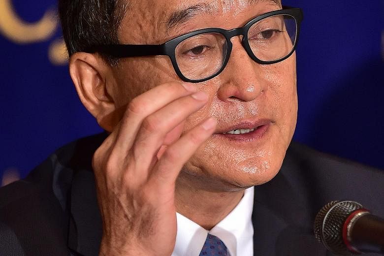 Cambodian opposition leader Sam Rainsy received a royal pardon in 2013 for his conviction on a defamation charge.