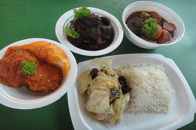 From left: Popo & Nana's Nonya Ayam Masak Merak, Nonya Pork Rib Buah Keluak and Beef Smore served with rice and chap chye.