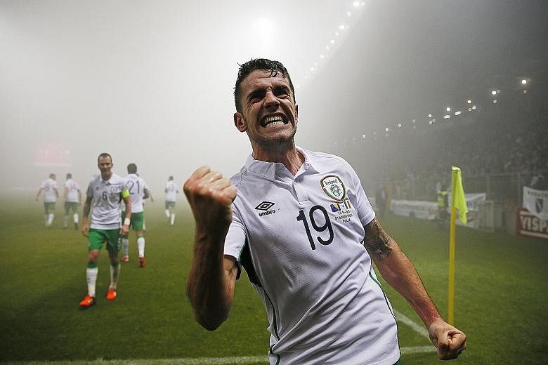 Robbie Brady lights up Ireland's mood with his goal late in the play-off game, only for Edin Dzeko to equalise three minutes later for Bosnia in the first leg affected by fog.