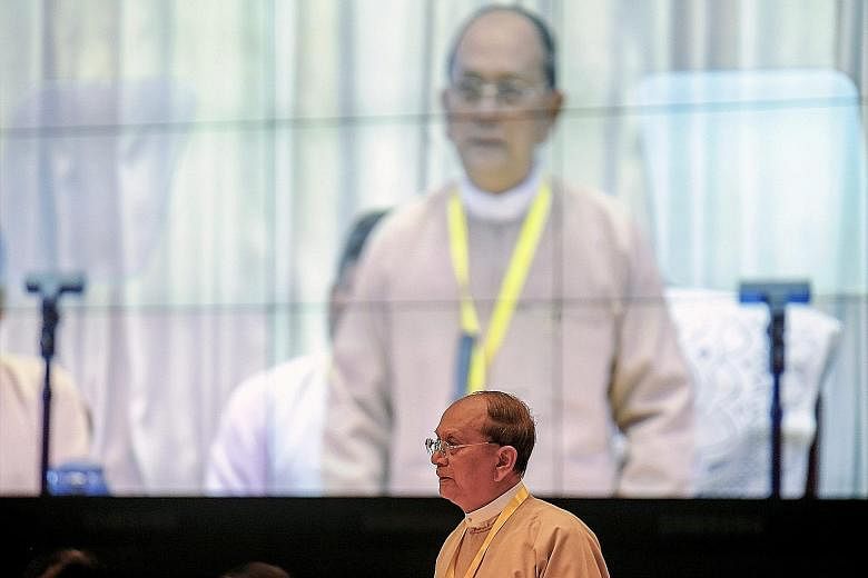 Myanmar President Thein Sein (above) speaking at a meeting of nearly 90 political parties in Yangon yesterday. The former junta general appeared sanguine about the resounding defeat of his army-backed Union Solidarity and Development Party, which wil