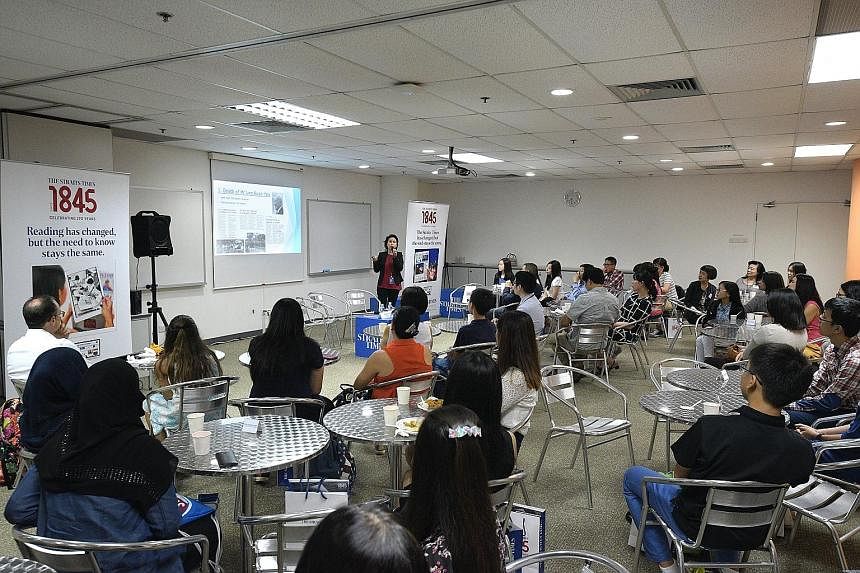 Forum editor Liaw Wy-Cin speaking at the ST Young Forum Writers dialogue yesterday at SPH News Centre in Toa Payoh. She encouraged the more than 20 young letter writers gathered to ask their peers to read the Home section first, where they might find