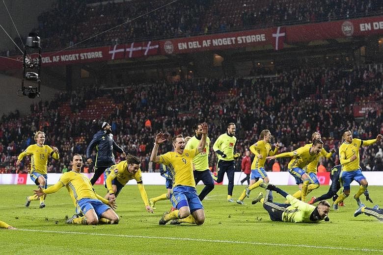 Captain Zlatan Ibrahimovic (second from left) celebrating with his Sweden team-mates, after the 2-2 draw with Denmark in Copenhagen on Tuesday gave them a 4-3 win on aggregate to qualify for Euro 2016.