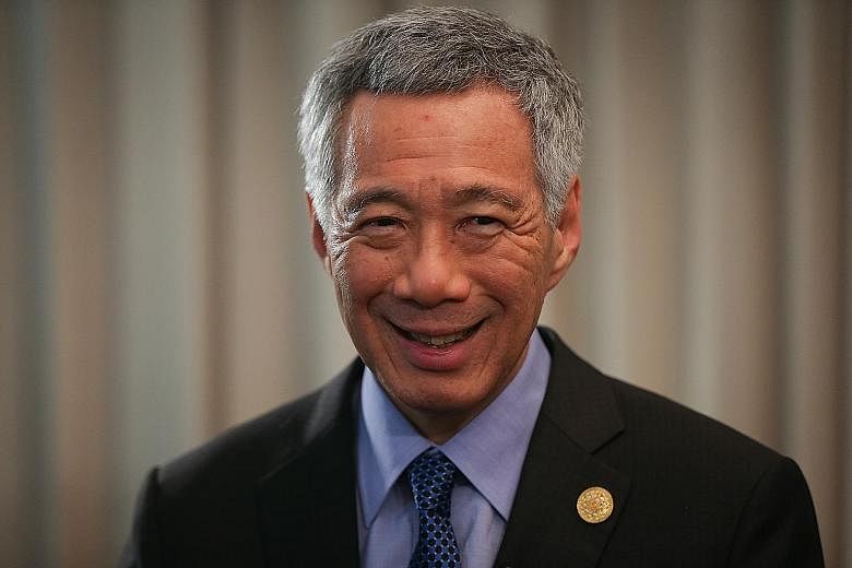 Prime Minister Lee Hsien Loong suggested that countries start opening up their service industry by focusing on sectors that will smoothen trade flow, such as telecommunications and logistics.