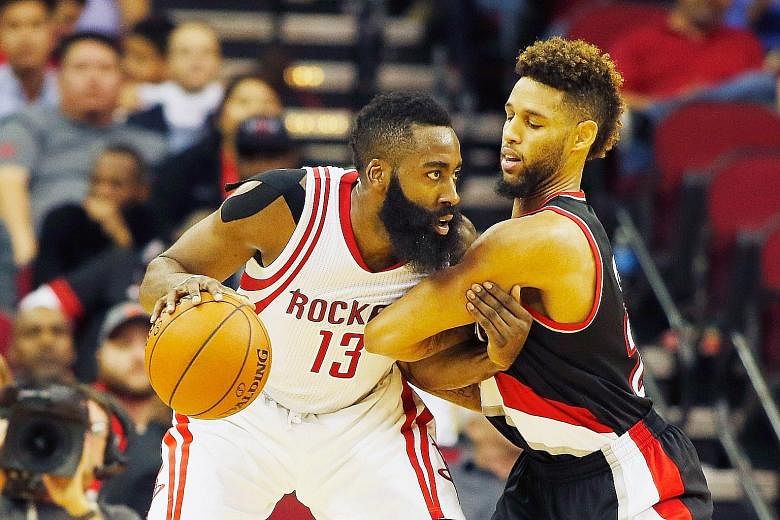 James Harden, up against Portland Trail Blazers' Allen Crabbe, was a man with a mission on Wednesday. Stung by the sacking of coach Kevin McHale, the Houston Rockets guard scored 45 points.