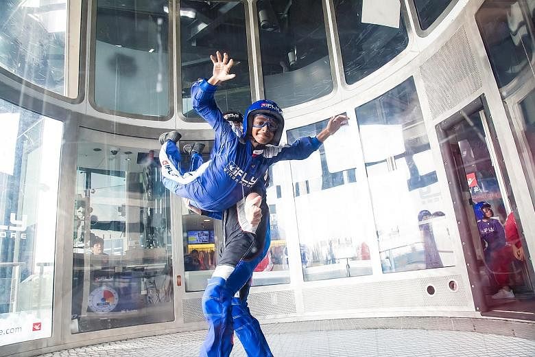 SPMF beneficiary Suriyan, 11, trying out the iFly facility yesterday. He is excited about visiting Disneyland in Hong Kong, calling it a dream come true.