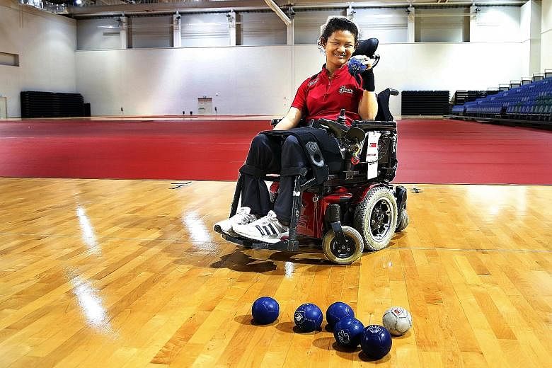 Throwing a ball at another seems easy but Juni Syafiqa Jumat says spasms, because of her condition, can complicate matters.