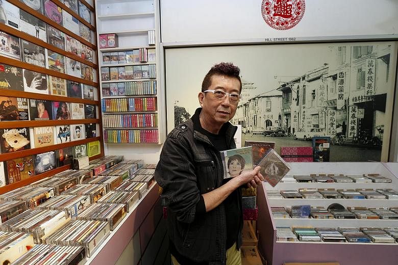 Mr Paul Lim, owner of Roxy Records & Trading, said his store is being kept afloat by a niche customer base. It carries music from local artists and sells tickets to their concerts.