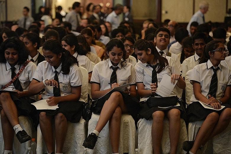 Indian Prime Minister Narendra Modi speaking at the 37th Singapore Lecture at the Shangri-La Hotel yesterday, attended by an audience of more than 1,000, including students (far right) from DPS International School, an Indian international school in 