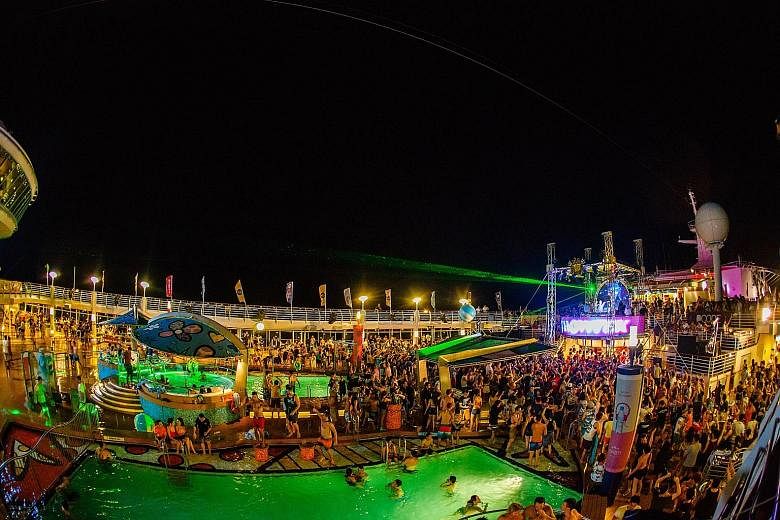 Dutch DJs Showtek took the stage on the ship (above right) on the first day; and partygoers with DJ Kaskade in Langkawi.