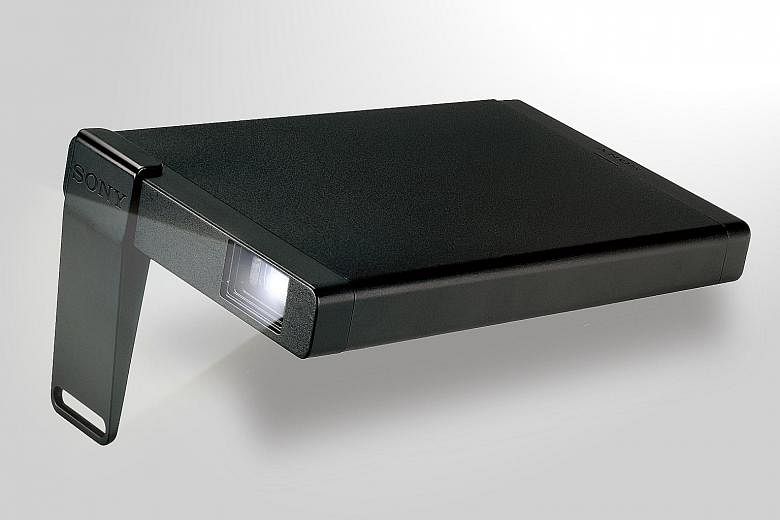 Sony's MP-CL1, housed in a matt aluminium casing, weighs about 200g. But despite its diminutive size, the pico projector is powerful enough to throw a bright image onto most walls, both in indoor and outdoor settings. It comes with laser beam scannin