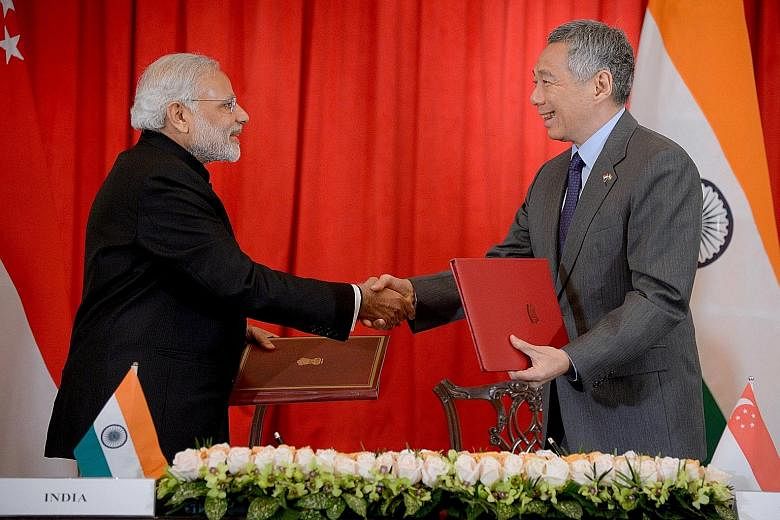 Indian Prime Minister Narendra Modi and Singapore PM Lee Hsien Loong at the signing of the strategic partnership agreement at the Istana yesterday.