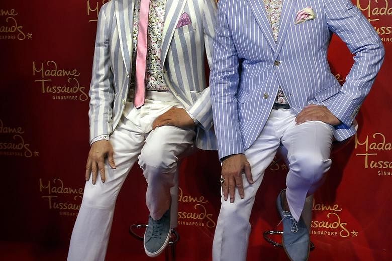 Singer-composer Dick Lee unveiled his wax figure at Madame Tussauds Singapore in Sentosa yesterday morning. His wax figure, created by a team of 20 studio artists over four months, will be shown in the A-list area of the wax museum alongside Hollywoo