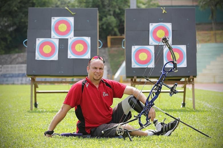 Robert Fuchs, 40, at a training session at Queenstown Stadium. He lost his left leg last year when his motorcycle hit a car. He will be competing in the individual and mixed team compound bow events at the APG.