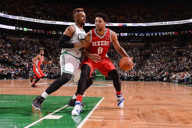 Nineteen-year-old Jahlil Okafor (right) is on a Philadelphia 76ers team who are the youngest in the NBA. The loss to the Boston Celtics puts their record at 0-16, just one defeat away from tying the 0-17 start last season.