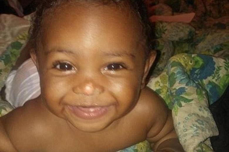 J'Zyra Thompson (above), who was 19 months old, had apparently kicked the oven door while she was trapped inside. This made the oven topple over with the door face down on the floor.