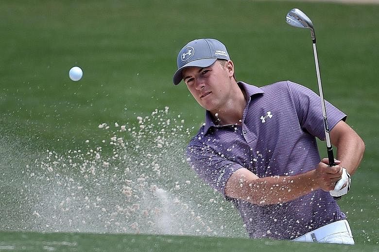 American world No. 1 Jordan Spieth blasting out of the bunker on the second day of the Australian Open in Sydney, where he shares third place. He does not see a problem if Ryder vice-captains Tiger Woods and Jim Furyk qualify as players, as they woul