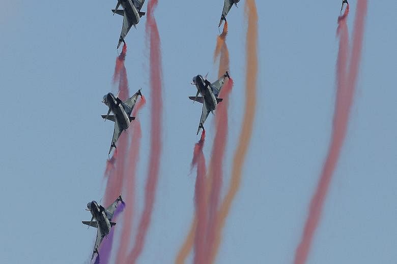 Chinese Chengdu J-10 fighter jets from the People's Liberation Army Air Force during an air show in Thailand on Thursday. China has been trying to assume a more proactive foreign security policy, as it seeks to take on a greater global role.