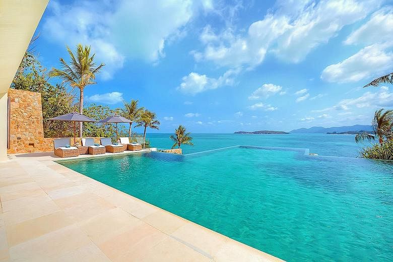 The infinity pool and view from one of Samujana's 27 villas in Koh Samui.