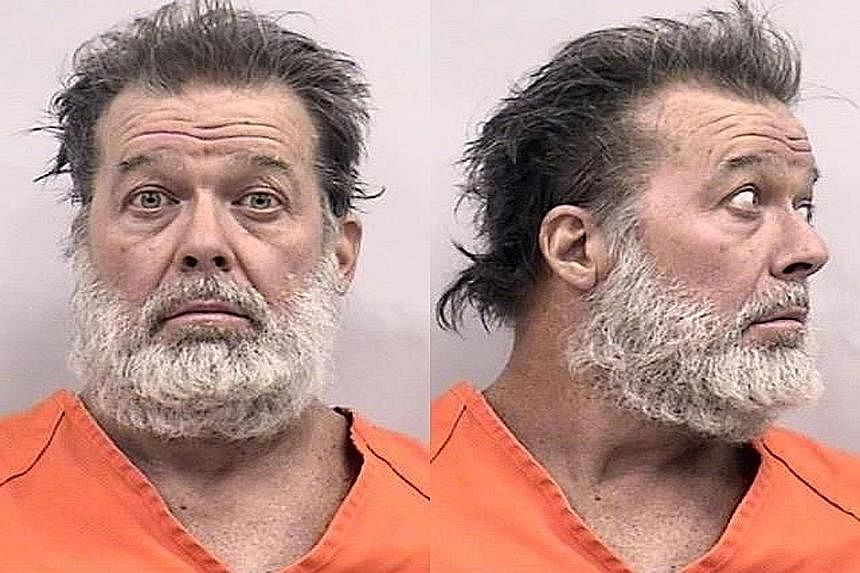 Police in Colorado Springs taking into custody a man who stormed the city's Planned Parenthood clinic and allegedly opened fire. A police officer and two civilians were killed, while nine others - among them five officers - were wounded, though none 