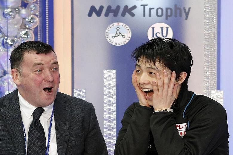 Yuzuru Hanyu bringing the house down with his stunning performance at the ISU Grand Prix figure skating NHK Trophy in Nagano before celebrating with his Canadian coach Brian Orser (far left). Hanyu's 322.40-point total was way above the previous reco