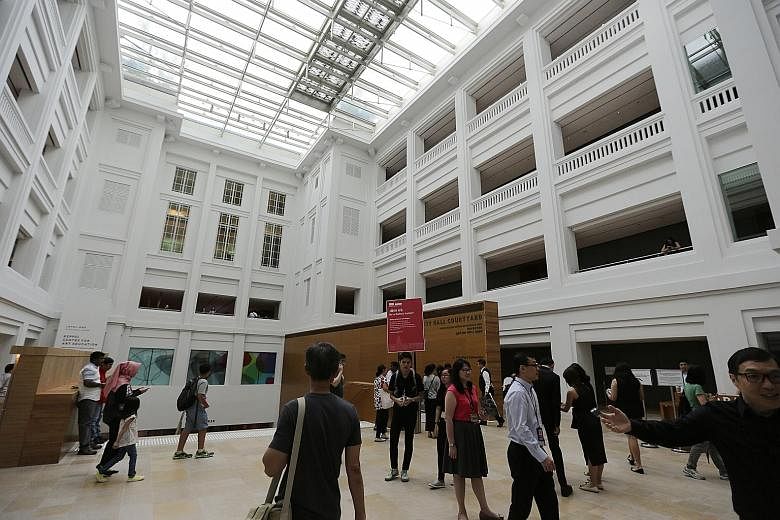 Interactive displays at the National Gallery, which brings together about 8,000 works of art from the 19th century to the modern day. Some 800 of these works are displayed at any one time in its permanent galleries: the DBS Singapore Gallery and UOB 