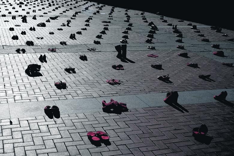 A total of 1,800 red women's shoes were placed at the Plaza Mayor of Valladolid in Spain as part of an installation to mark the "International Day for the Elimination of Violence Against Women" last Wednesday. The event, which was also marked in Fran