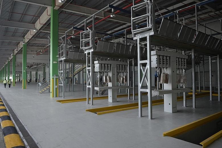 The engineering bays for bus maintenance at Tower Transit's Bulim depot. The facility can accommodate 500 buses. The company said it will start operations progressively from the second quarter of next year.