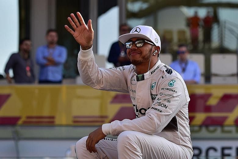 A relaxed Lewis Hamilton before the start of the season's final race in Abu Dhabi. After securing his third championship in Austin, Texas, he was beaten by team-mate Nico Rosberg in Mexico, Brazil and Abu Dhabi.