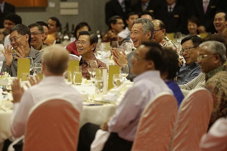 Prime Minister Lee Hsien Loong sharing a light moment during dinner at Parliament House with retired and current MPs, including former officeholders (from left) Mr Lui Tuck Yew, Mr Wong Kan Seng, Mr Mah Bow Tan and Mr Hawazi Daipi. At the dinner, he 