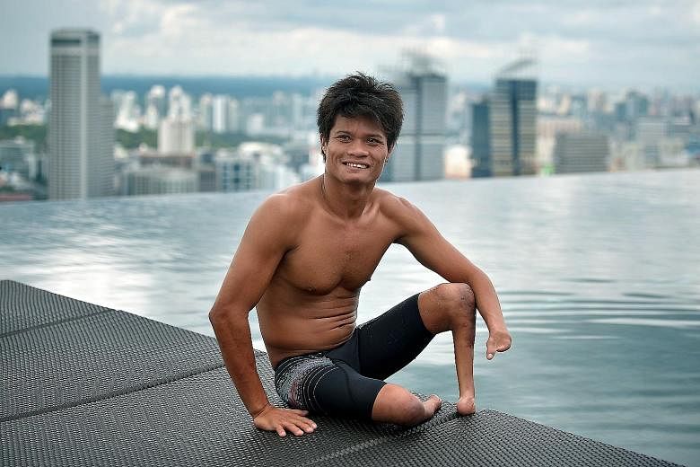 Ernie Gawilan, 24, will compete in three individual and two relay events at the OCBC Aquatic Centre. Sports has offered him another purpose in life and he wants to inspire other people with disabilities.