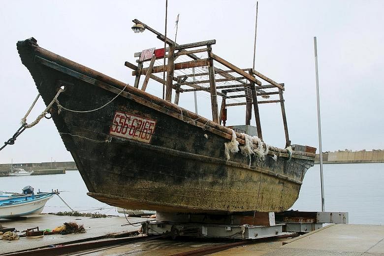 This unidentified wooden boat was found in the sea off Japan's Noto Peninsula last month.