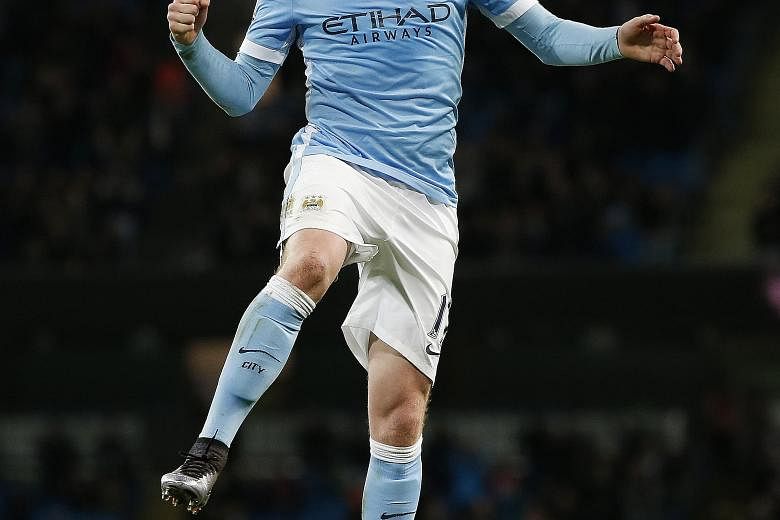 Kevin de Bruyne celebrates after scoring the final goal for Manchester City in the 4-1 win against Hull City in the League Cup encounter at the Etihad Stadium on Tuesday.
