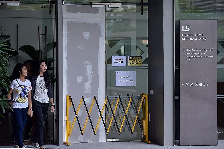 Tuesday's accident at the newly opened National Gallery Singapore left one man with minor abrasions on his right hand. A spokesman for the gallery said that there is no set date for the glass door to be repaired.