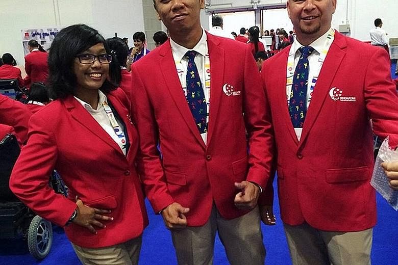 Nur Syahidah Alim with archery team-mates Kevin Wong and Robert Fuchs before the Opening Ceremony: "We are all (red)y to go for the opening ceremony!"