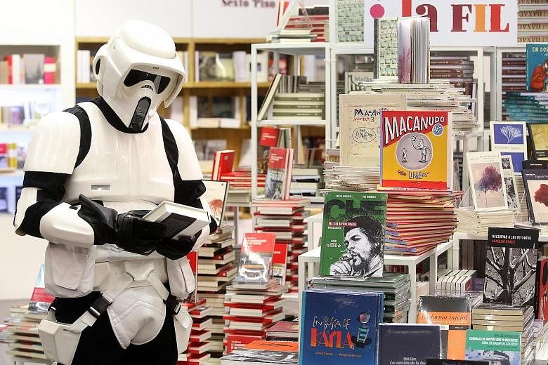 People dressed up as Star Wars characters attending the Guadalajara International Book Fair in Guadalajara, Mexico, on Wednesday. They were given free entry into the Expo Guadalajara convention centre, where the most famous literary fair for Hispanic