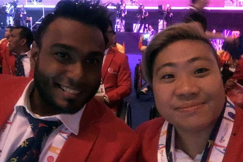 Swimmer Theresa Goh taking a wefie with wheelchair racer Muhammad Firdaus Nordin at last night's Opening Ceremony. 