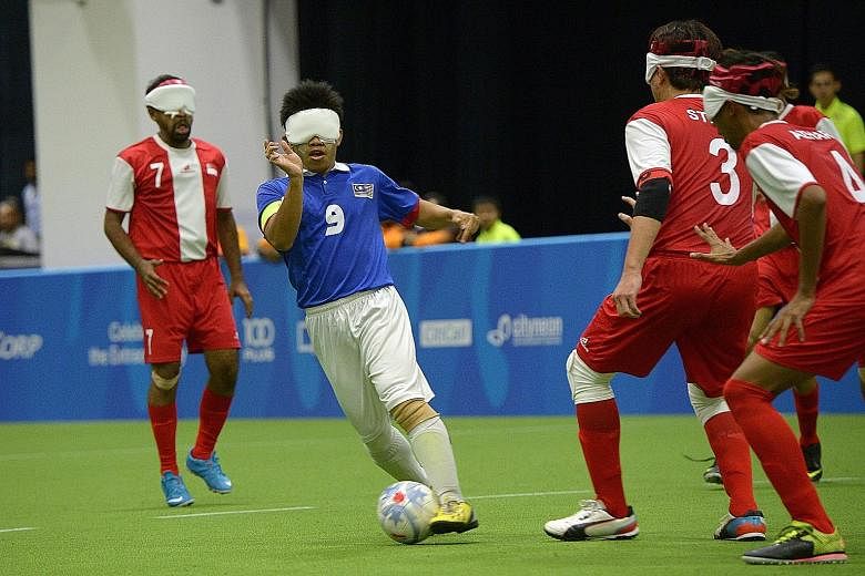 Mohd Azwan (No.9) dazzled in the game between Singapore and Malaysia, which drew a 900-strong crowd, including Prime Minister Lee Hsien Loong and Minister for Culture, Community and Youth Grace Fu.