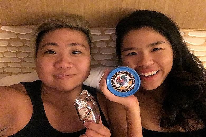 Para-swimmers Theresa Goh (left) and Yip Pin Xiu posing for a wefie.