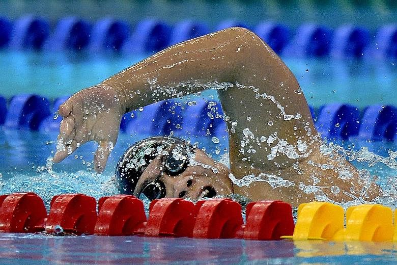 Theresa Goh wins Singapore's first gold at the Asean Para Games, finishing first in the 100m freestyle S5 (S1-S5) with a time of 1min 45.51sec.