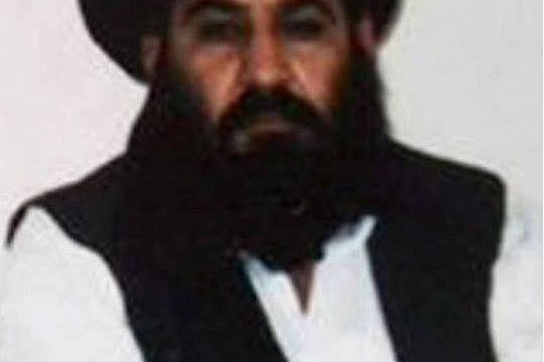 A handout photograph released by the Afghan Taleban on Thursday, which is said to be a picture of Mullah Akhtar Mansour taken last year. Reports of his death or wounding have been dismissed as "enemy propaganda" by the Taleban.