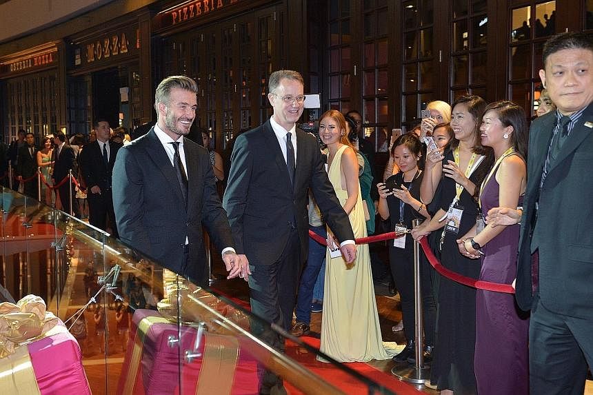 Gladys Ng won the Best Singapore Short Film award for My Father After Dinner, inspired by her foodie father. Former England football star David Beckham was a surprise guest at the Silver Screen Awards last night. A beaming Michelle Yeoh with her Cine