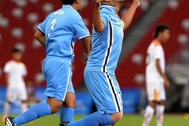 Khairul Anwar Kasmani (left) scoring from a free kick to complete his hat-trick against Myanmar yesterday. The Singapore captain now has four goals to his credit in this Asean Para Games.