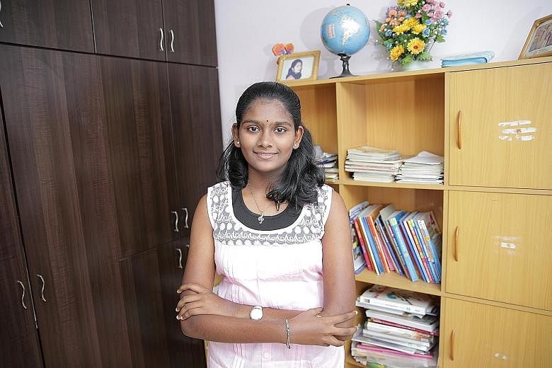 Natarajan Anitha Phireethi, 13, credits her tutors at Sinda's tuition programme for helping her ace last year's Primary School Leaving Examination. The former Lianhua Primary School pupil scored four A*s and is now a student at Raffles Girls' School 