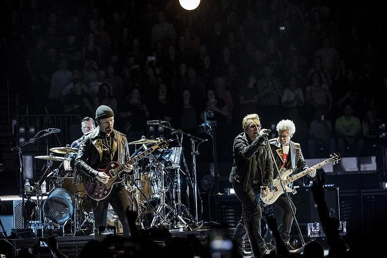From left: Larry Mullen, the Edge, Bono and Adam Clayton of U2 performing at Madison Square Garden in New York in July.
