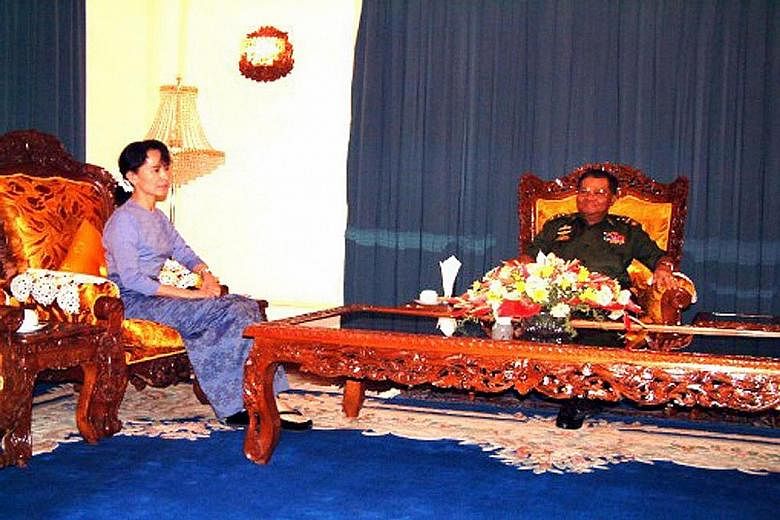 An undated photograph splashed across the front page of the state-run New Light of Myanmar showing democracy leader Aung San Suu Kyi with General Than Shwe. The last time she met the general was in 2003.