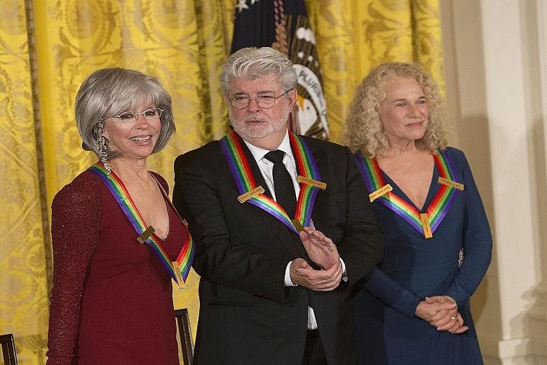 Kennedy Center Honors recipients: (From far left) actress and singer Rita Moreno, Star Wars creator George Lucas and singer- songwriter Carole King.